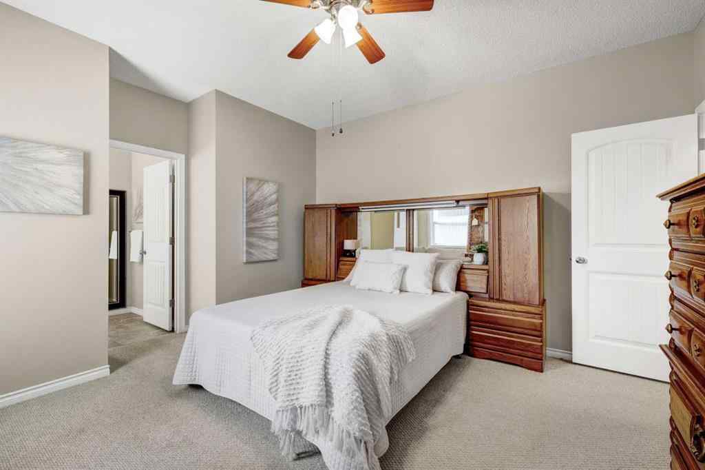 MLS® A2253501 - 1402 Ravenscroft Avenue SE in Ravenswood Airdrie, Residential