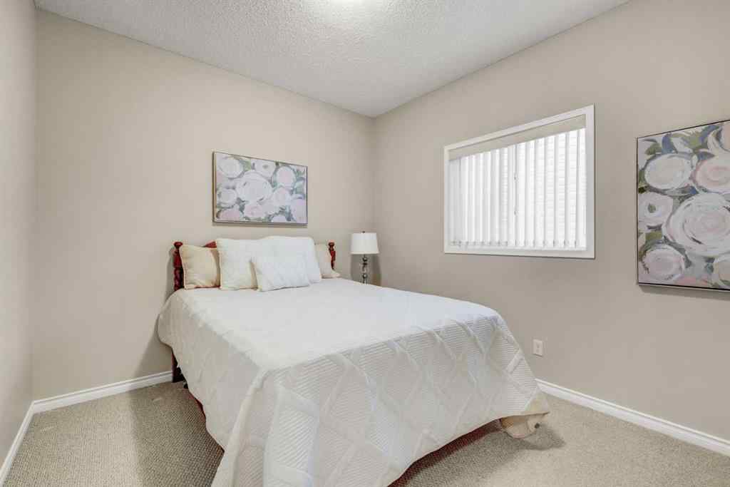 MLS® A2253501 - 1402 Ravenscroft Avenue SE in Ravenswood Airdrie, Residential