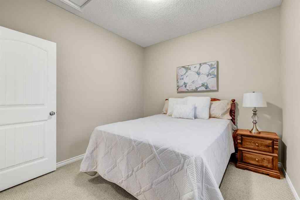 MLS® A2253501 - 1402 Ravenscroft Avenue SE in Ravenswood Airdrie, Residential