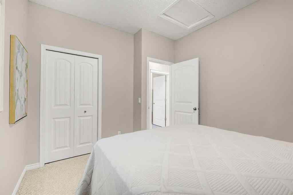 MLS® A2253501 - 1402 Ravenscroft Avenue SE in Ravenswood Airdrie, Residential