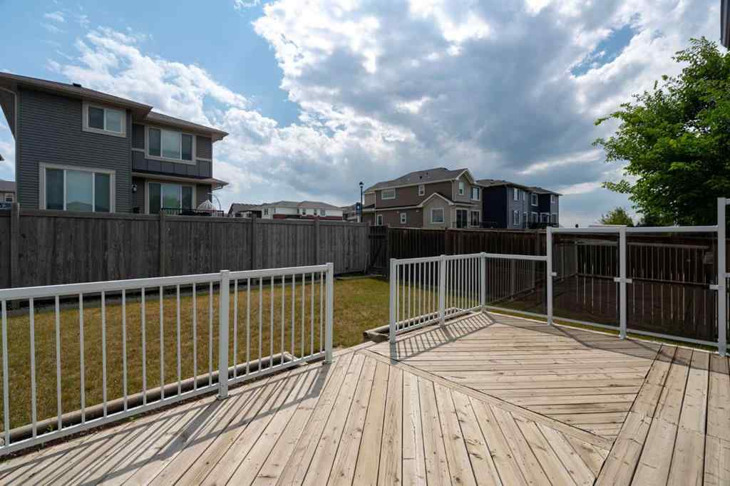 MLS® A2253501 - 1402 Ravenscroft Avenue SE in Ravenswood Airdrie, Residential