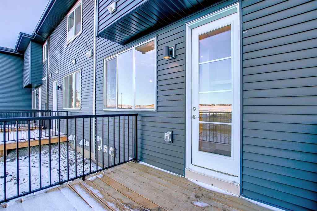 MLS® A2253516 - 310 Sundown Road  in Sunset Ridge Cochrane, Residential