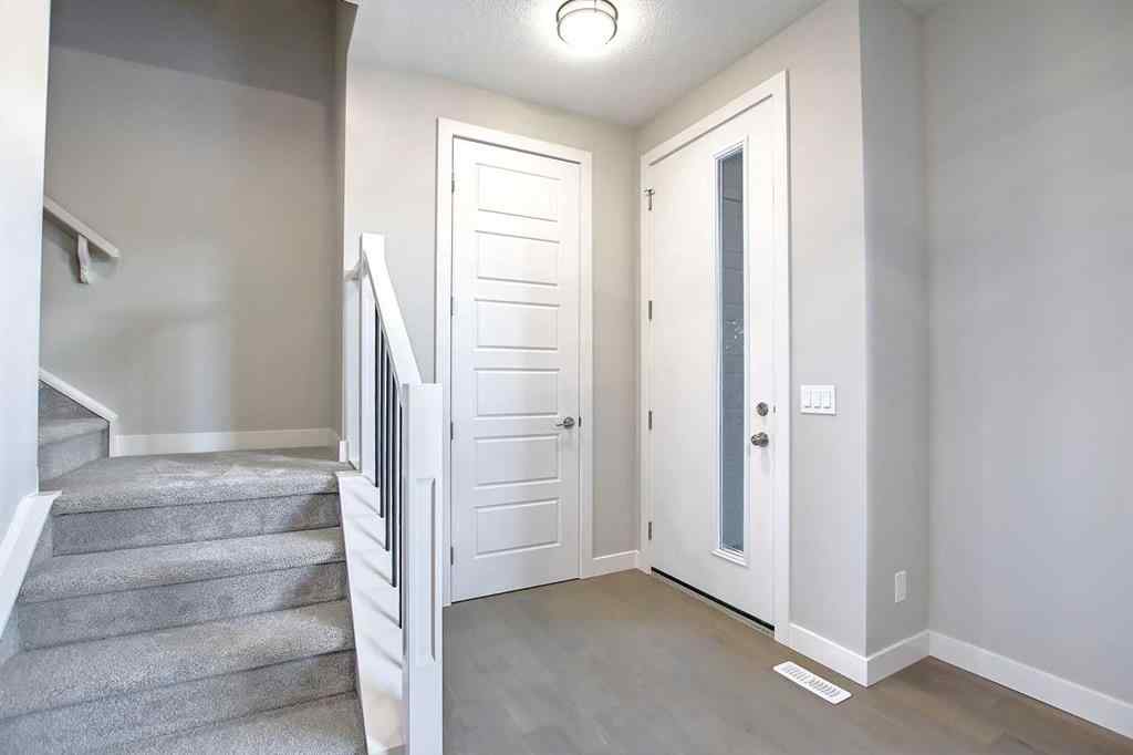 MLS® A2253516 - 310 Sundown Road  in Sunset Ridge Cochrane, Residential