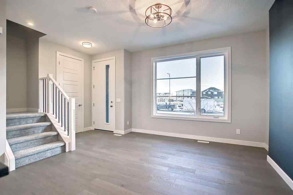 MLS® A2253516 - 310 Sundown Road  in Sunset Ridge Cochrane, Residential