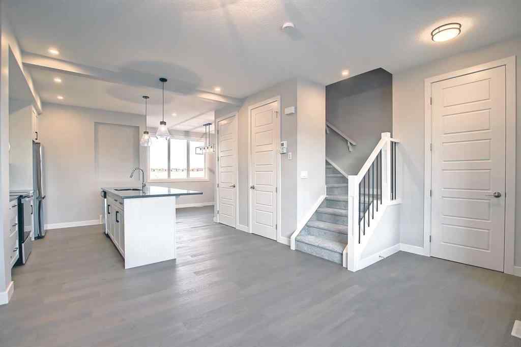 MLS® A2253516 - 310 Sundown Road  in Sunset Ridge Cochrane, Residential