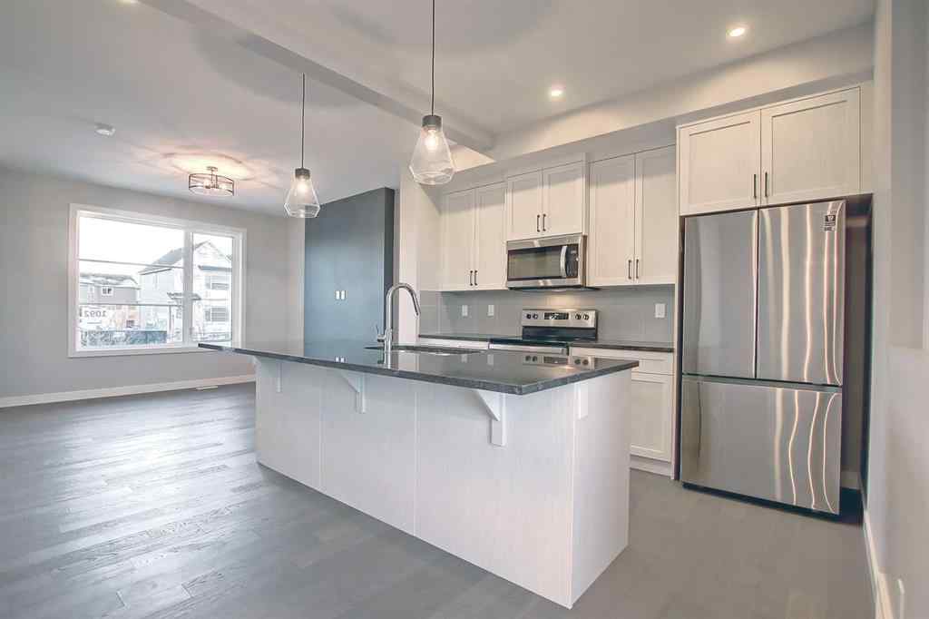 MLS® A2253516 - 310 Sundown Road  in Sunset Ridge Cochrane, Residential