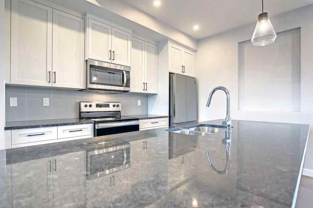 MLS® A2253516 - 310 Sundown Road  in Sunset Ridge Cochrane, Residential