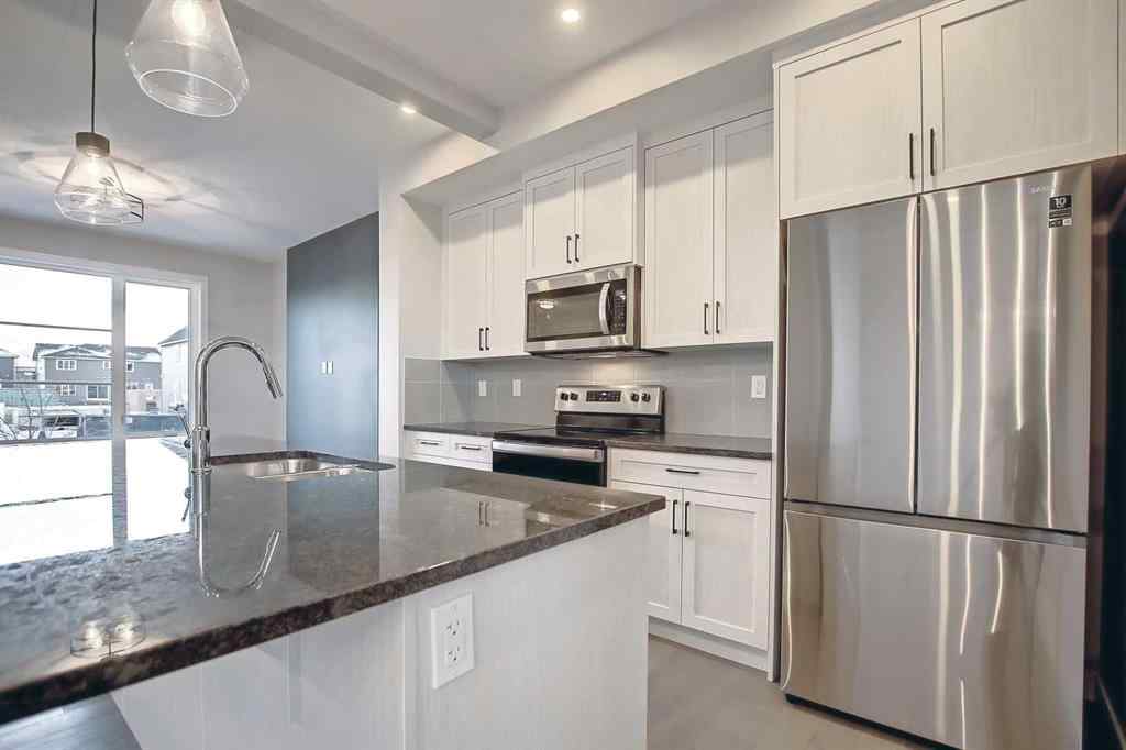 MLS® A2253516 - 310 Sundown Road  in Sunset Ridge Cochrane, Residential