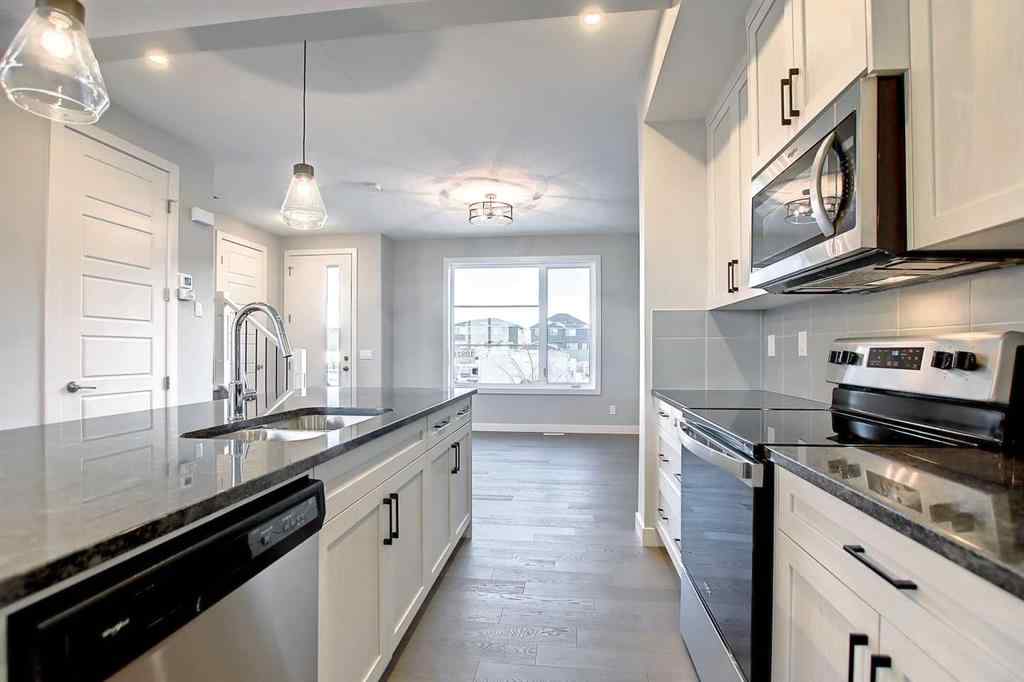 MLS® A2253516 - 310 Sundown Road  in Sunset Ridge Cochrane, Residential
