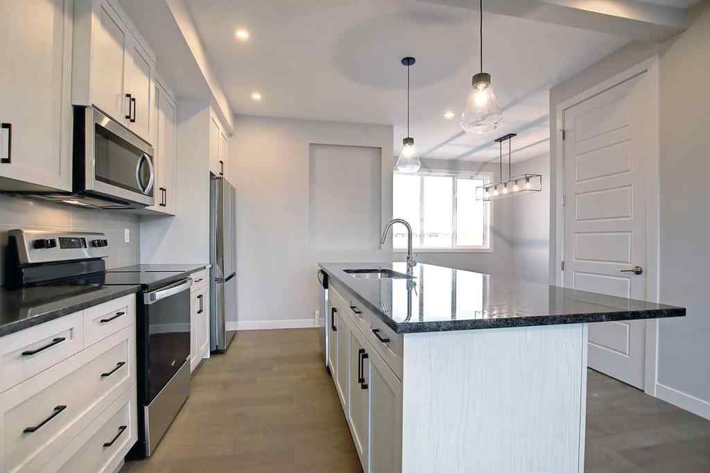 MLS® A2253516 - 310 Sundown Road  in Sunset Ridge Cochrane, Residential