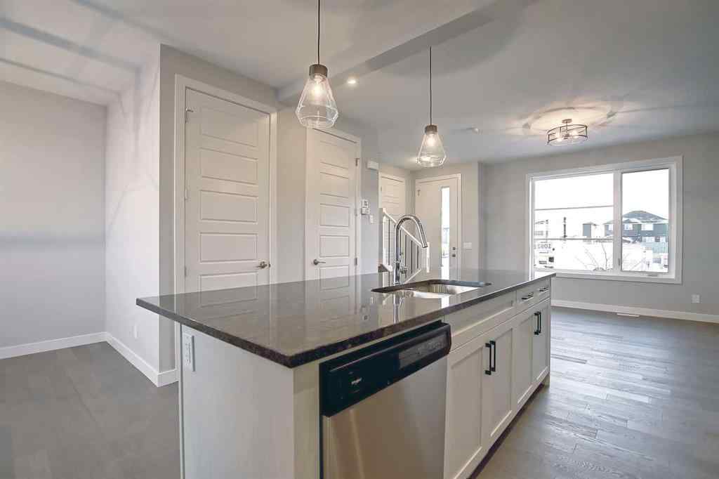 MLS® A2253516 - 310 Sundown Road  in Sunset Ridge Cochrane, Residential