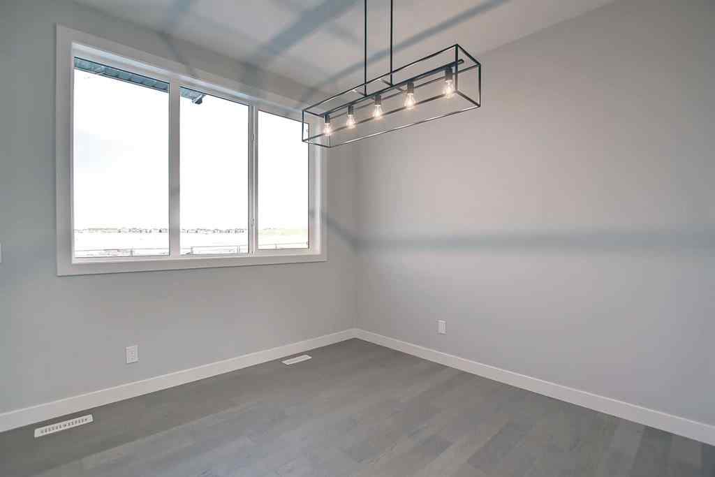 MLS® A2253516 - 310 Sundown Road  in Sunset Ridge Cochrane, Residential
