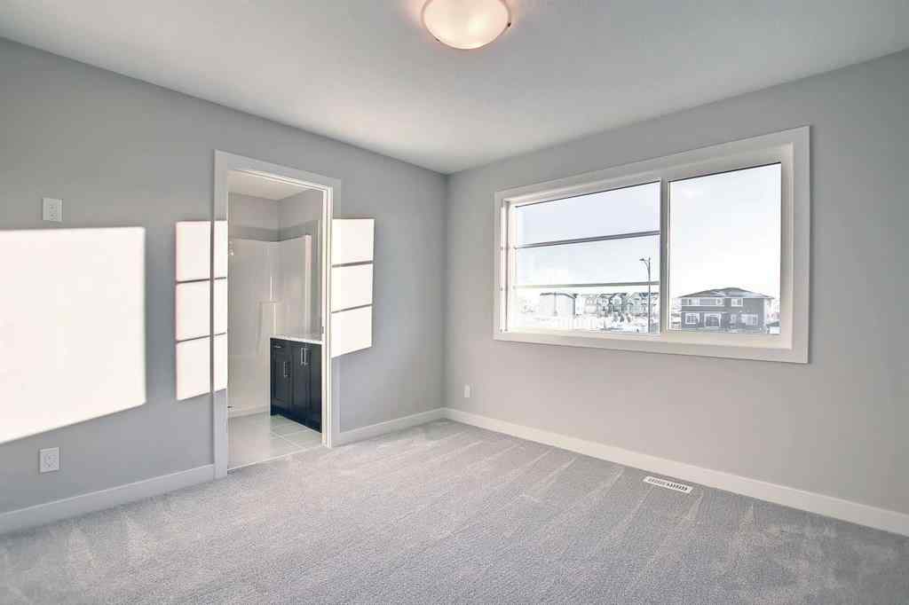 MLS® A2253516 - 310 Sundown Road  in Sunset Ridge Cochrane, Residential
