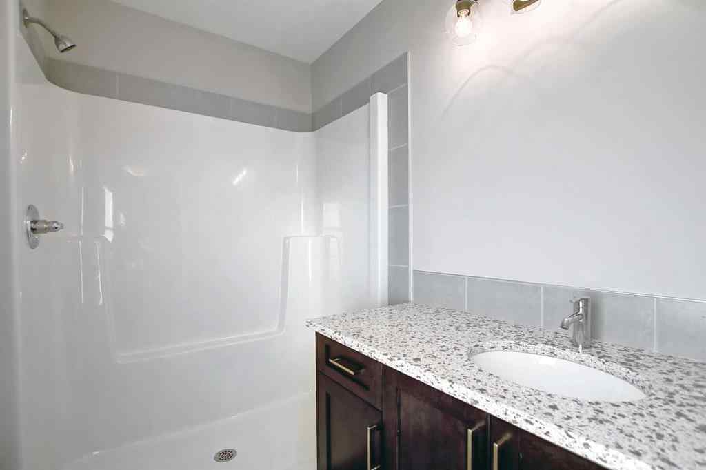 MLS® A2253516 - 310 Sundown Road  in Sunset Ridge Cochrane, Residential