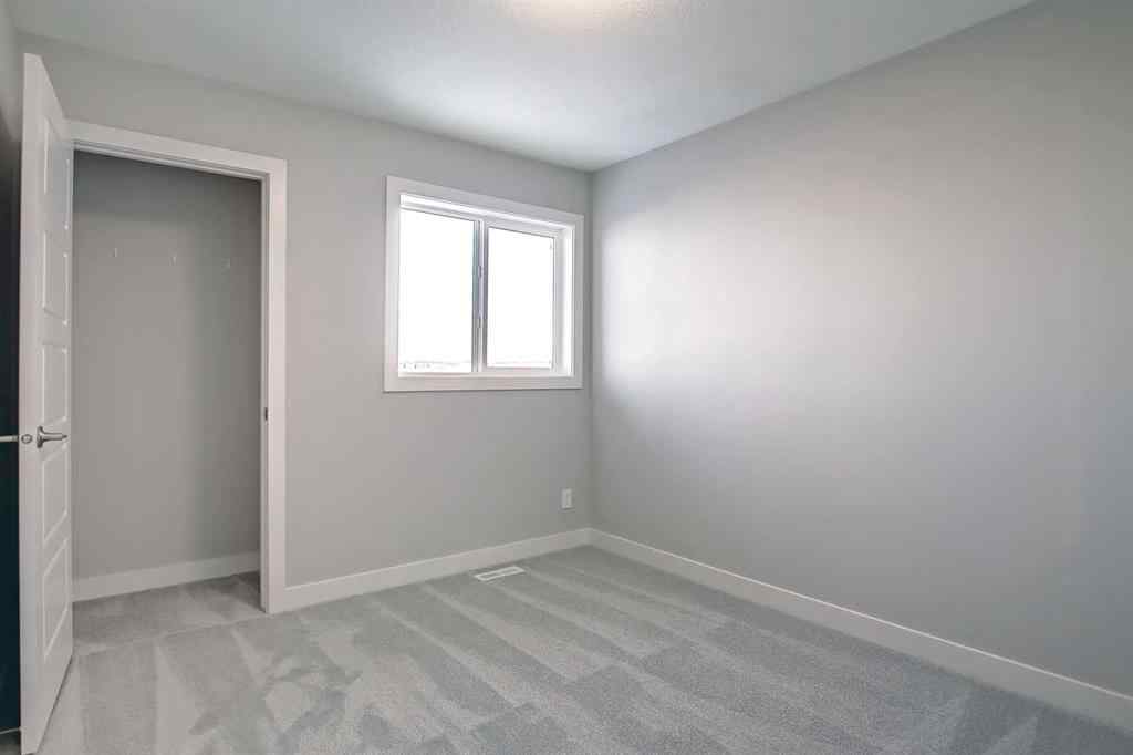 MLS® A2253516 - 310 Sundown Road  in Sunset Ridge Cochrane, Residential