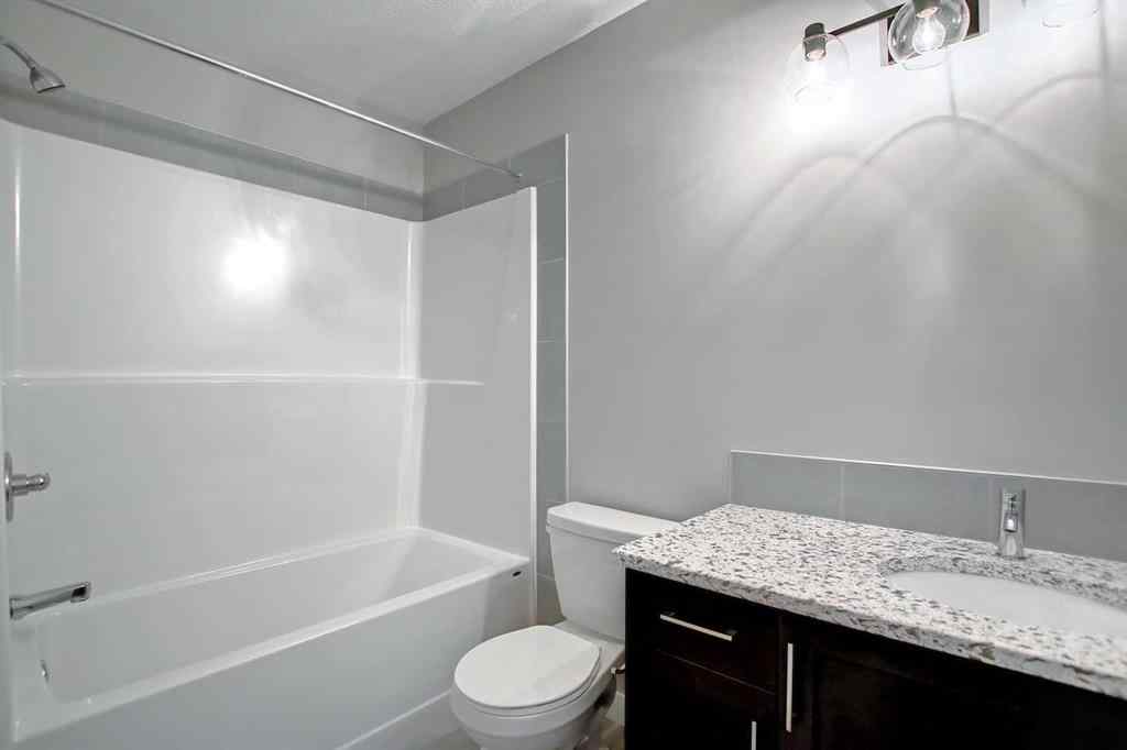MLS® A2253516 - 310 Sundown Road  in Sunset Ridge Cochrane, Residential