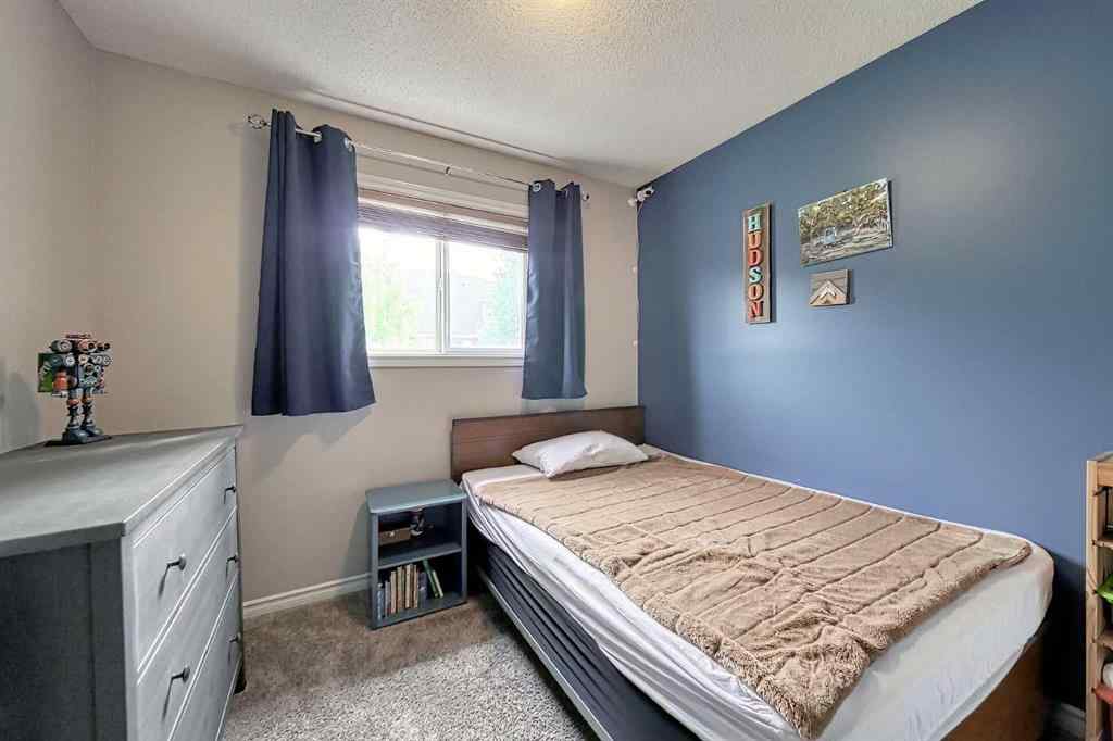 MLS® A2253525 - 144 Eversyde Circle SW in Evergreen Calgary, Residential
