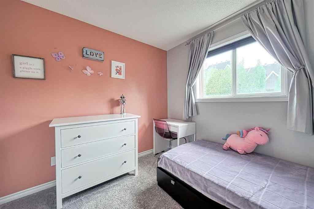 MLS® A2253525 - 144 Eversyde Circle SW in Evergreen Calgary, Residential