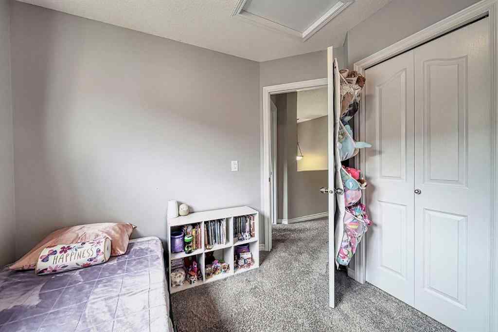 MLS® A2253525 - 144 Eversyde Circle SW in Evergreen Calgary, Residential
