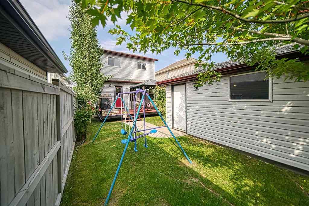 MLS® A2253525 - 144 Eversyde Circle SW in Evergreen Calgary, Residential
