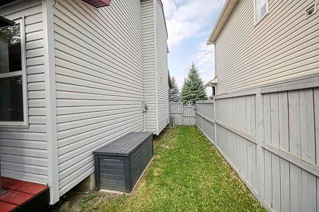 MLS® A2253525 - 144 Eversyde Circle SW in Evergreen Calgary, Residential