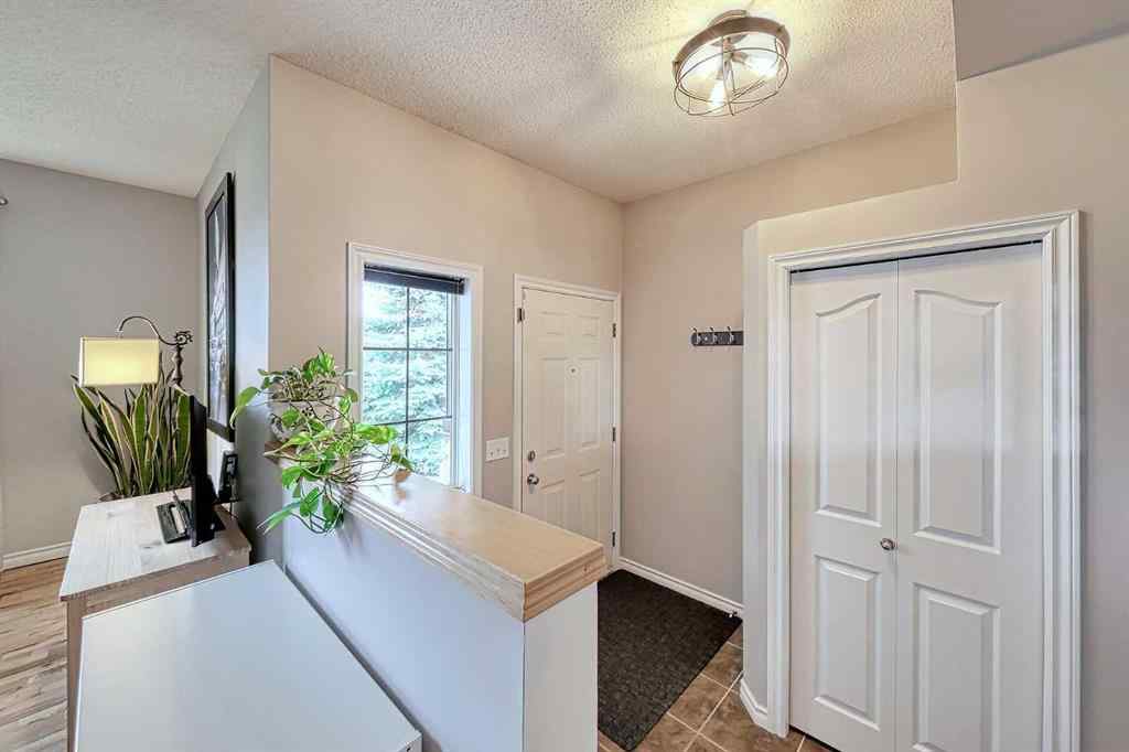 MLS® A2253525 - 144 Eversyde Circle SW in Evergreen Calgary, Residential