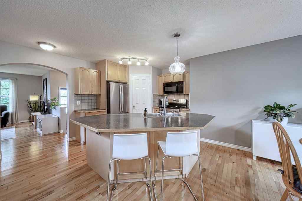 MLS® A2253525 - 144 Eversyde Circle SW in Evergreen Calgary, Residential