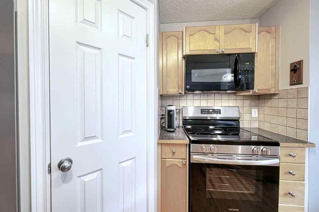 MLS® A2253525 - 144 Eversyde Circle SW in Evergreen Calgary, Residential
