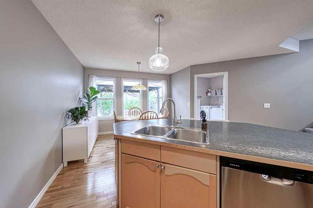 MLS® A2253525 - 144 Eversyde Circle SW in Evergreen Calgary, Residential