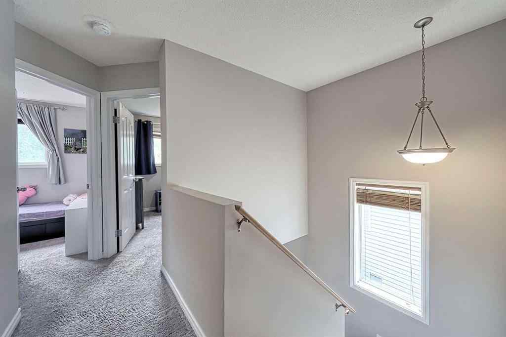 MLS® A2253525 - 144 Eversyde Circle SW in Evergreen Calgary, Residential