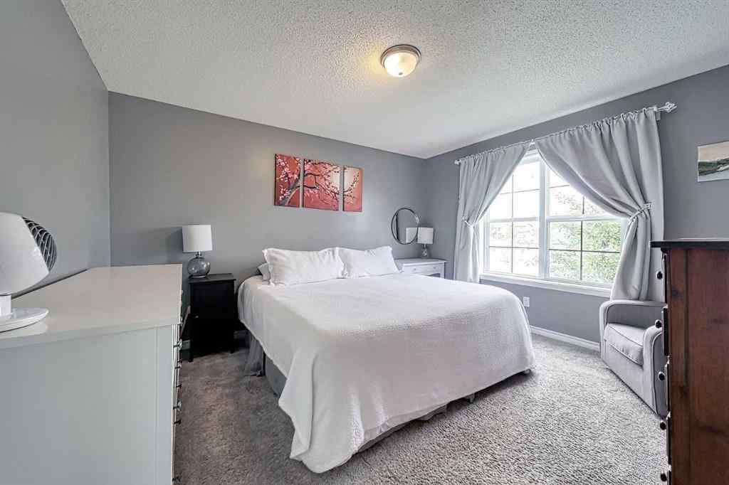 MLS® A2253525 - 144 Eversyde Circle SW in Evergreen Calgary, Residential