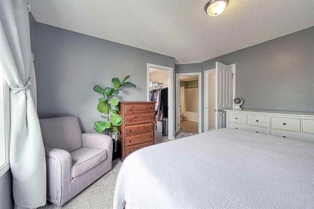MLS® A2253525 - 144 Eversyde Circle SW in Evergreen Calgary, Residential