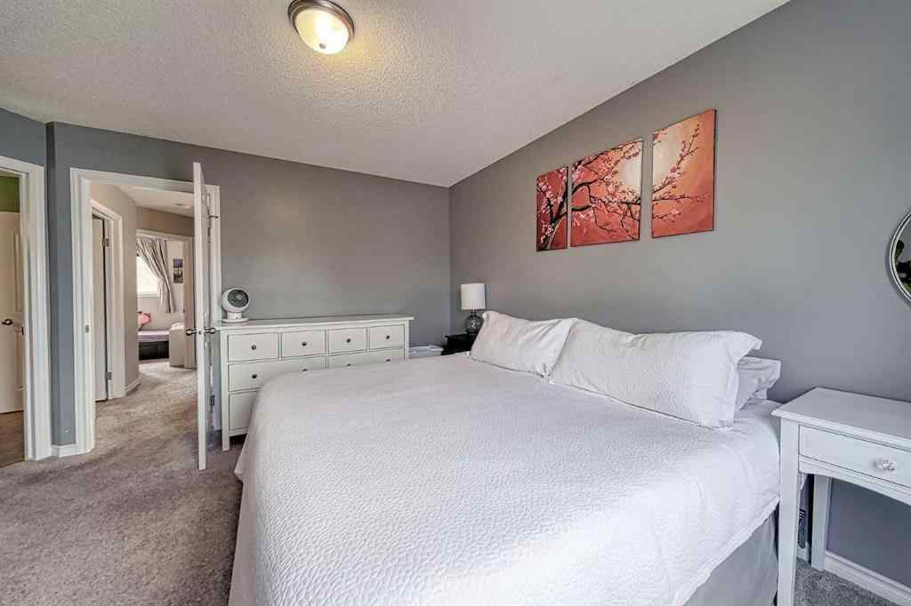 MLS® A2253525 - 144 Eversyde Circle SW in Evergreen Calgary, Residential