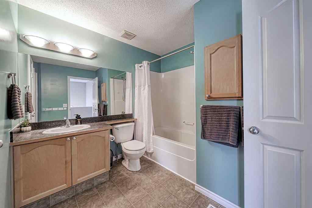 MLS® A2253525 - 144 Eversyde Circle SW in Evergreen Calgary, Residential