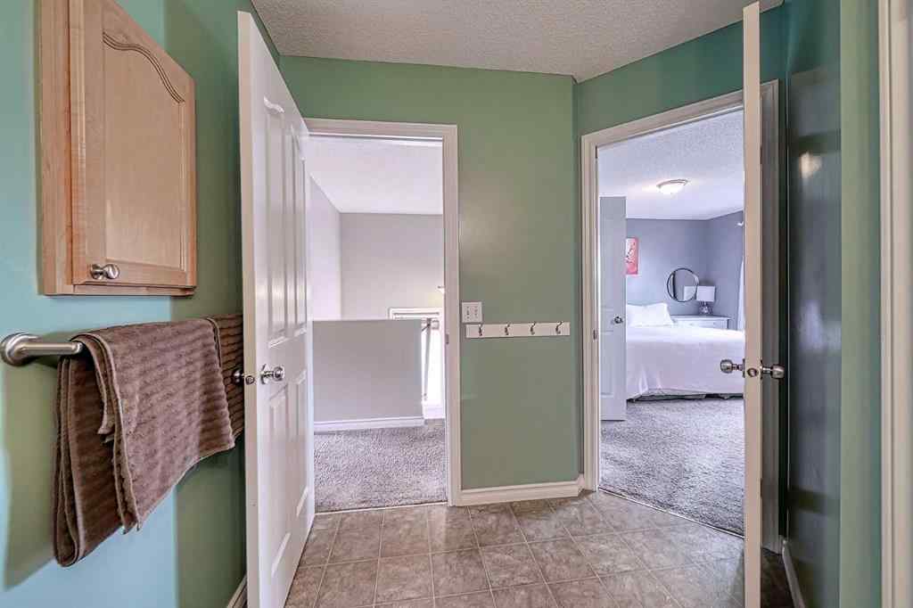 MLS® A2253525 - 144 Eversyde Circle SW in Evergreen Calgary, Residential
