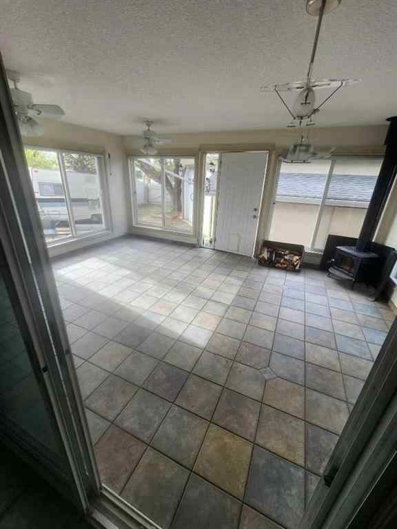 MLS® A2253558 - 9551 85 Avenue  in Highland Park Grande Prairie, Residential
