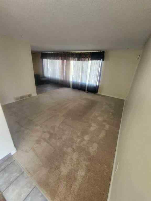 MLS® A2253558 - 9551 85 Avenue  in Highland Park Grande Prairie, Residential