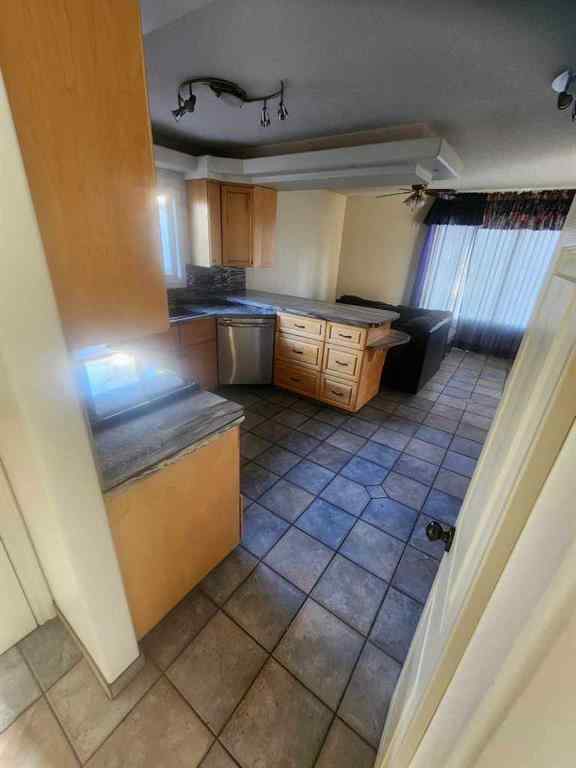 MLS® A2253558 - 9551 85 Avenue  in Highland Park Grande Prairie, Residential