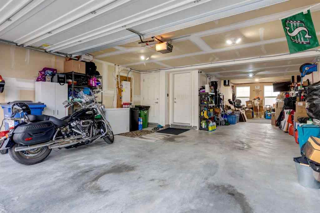 MLS® A2253570 - 165 Sundown Road  in Sunset Ridge Cochrane, Residential