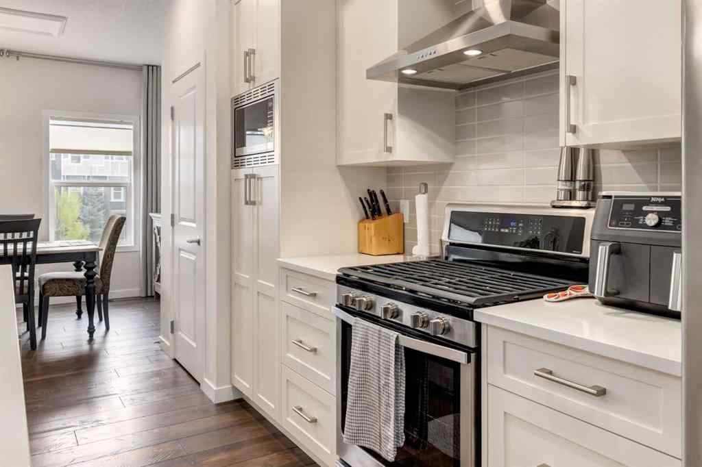 MLS® A2253570 - 165 Sundown Road  in Sunset Ridge Cochrane, Residential