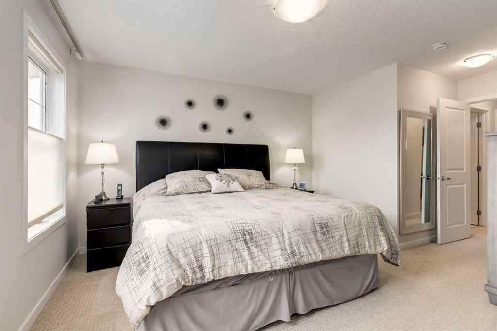 MLS® A2253570 - 165 Sundown Road  in Sunset Ridge Cochrane, Residential