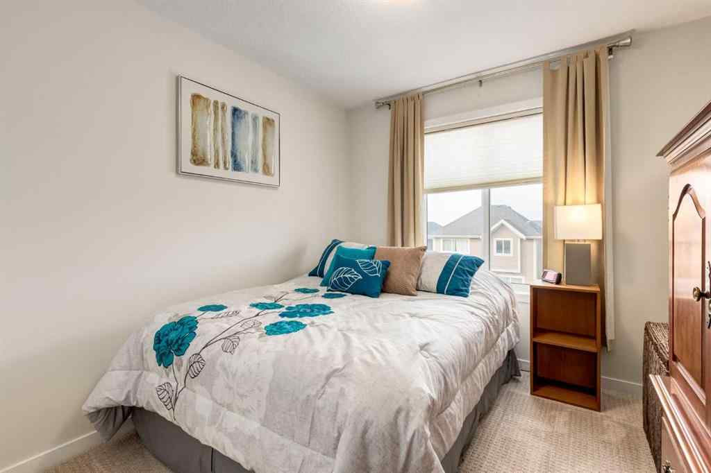 MLS® A2253570 - 165 Sundown Road  in Sunset Ridge Cochrane, Residential