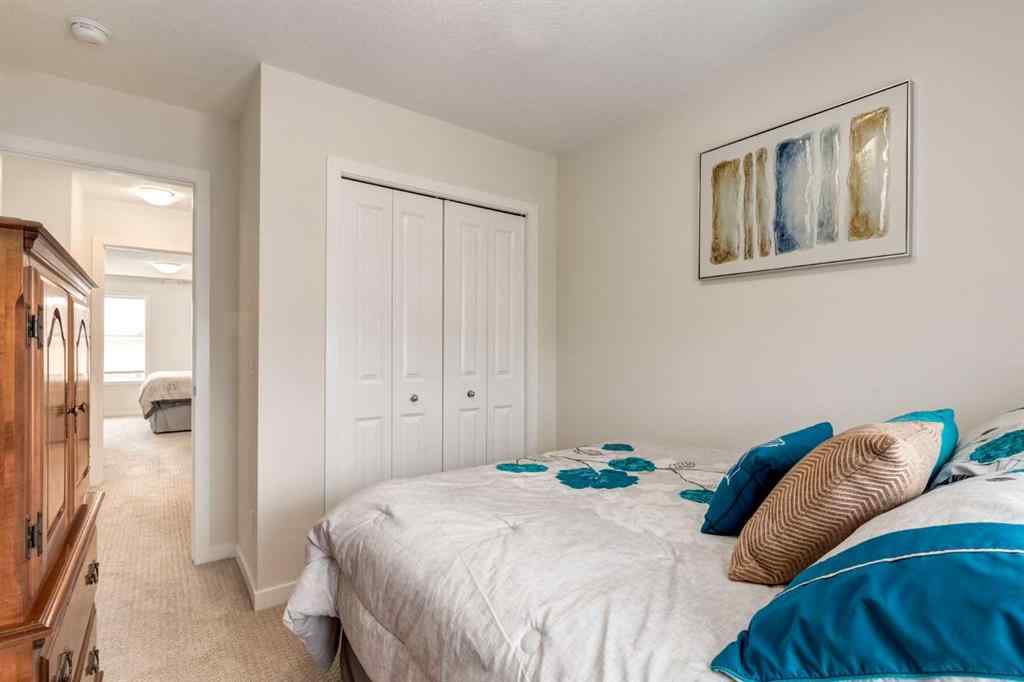 MLS® A2253570 - 165 Sundown Road  in Sunset Ridge Cochrane, Residential