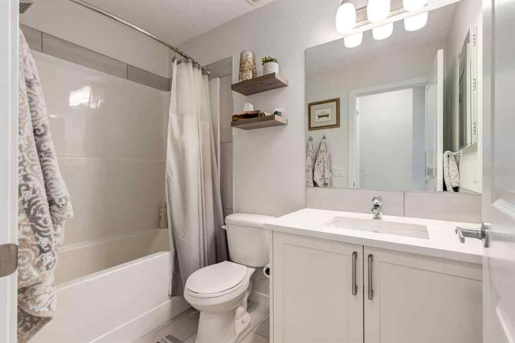 MLS® A2253570 - 165 Sundown Road  in Sunset Ridge Cochrane, Residential