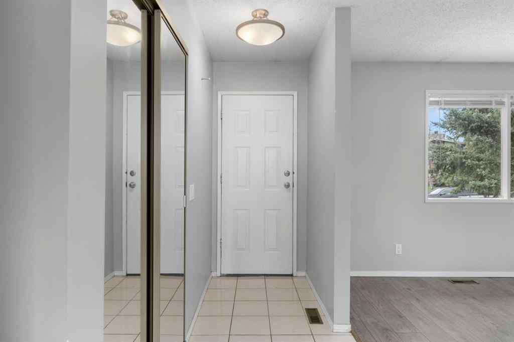 MLS® A2253572 - 71 Queen Alexandra Close SE in Queensland Calgary, Residential