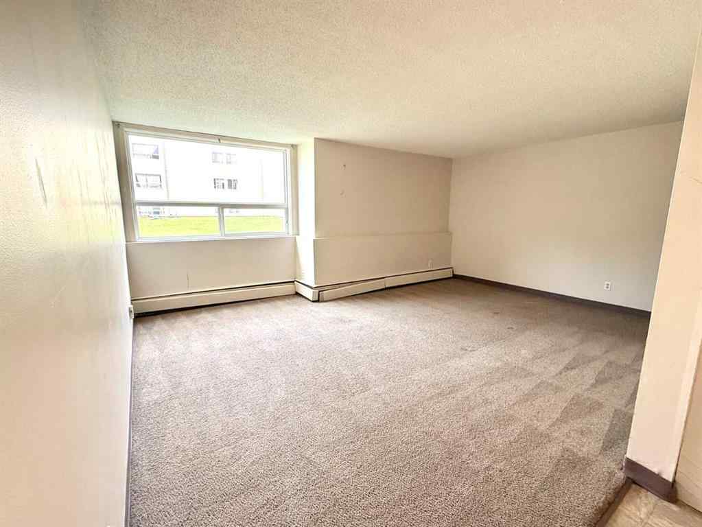 MLS® A2253594 - Unit #115 111 Charles Avenue  in Downtown Fort McMurray, Residential