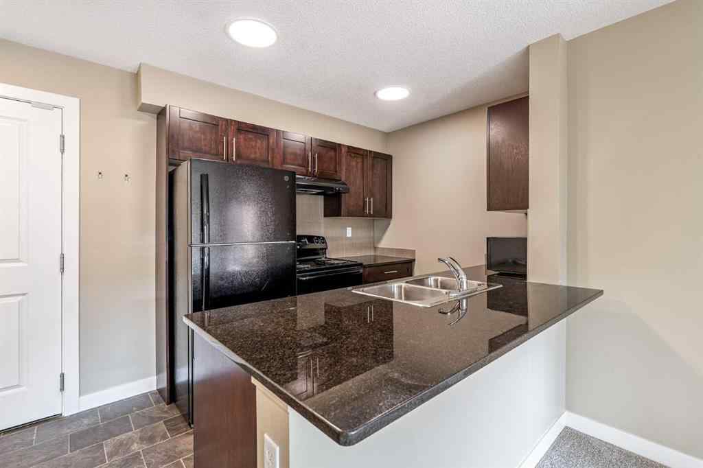 MLS® A2253595 - Unit #1407 403 Mackenzie Way SW in Downtown Airdrie, Residential