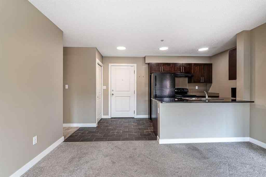 MLS® A2253595 - Unit #1407 403 Mackenzie Way SW in Downtown Airdrie, Residential