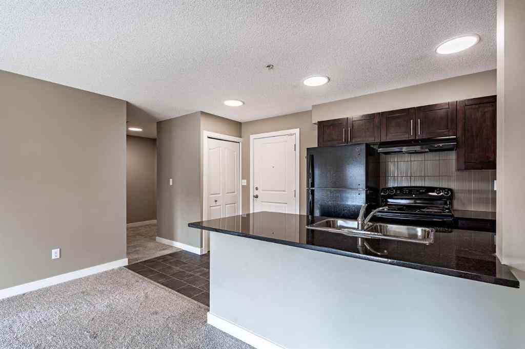 MLS® A2253595 - Unit #1407 403 Mackenzie Way SW in Downtown Airdrie, Residential