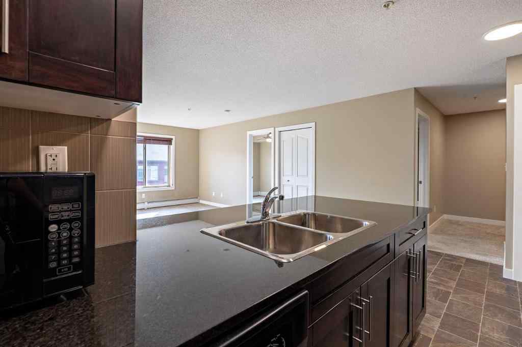 MLS® A2253595 - Unit #1407 403 Mackenzie Way SW in Downtown Airdrie, Residential
